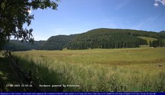 view from Webcam Cansiglio - verso la piana dei "Bech" on 2025-06-27