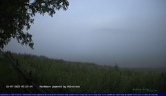 view from Webcam Cansiglio - verso la piana dei "Bech" on 2025-07-15