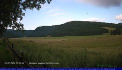 view from Webcam Cansiglio - verso la piana dei "Bech" on 2025-07-19