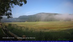 view from Webcam Cansiglio - verso la piana dei "Bech" on 2026-07-07