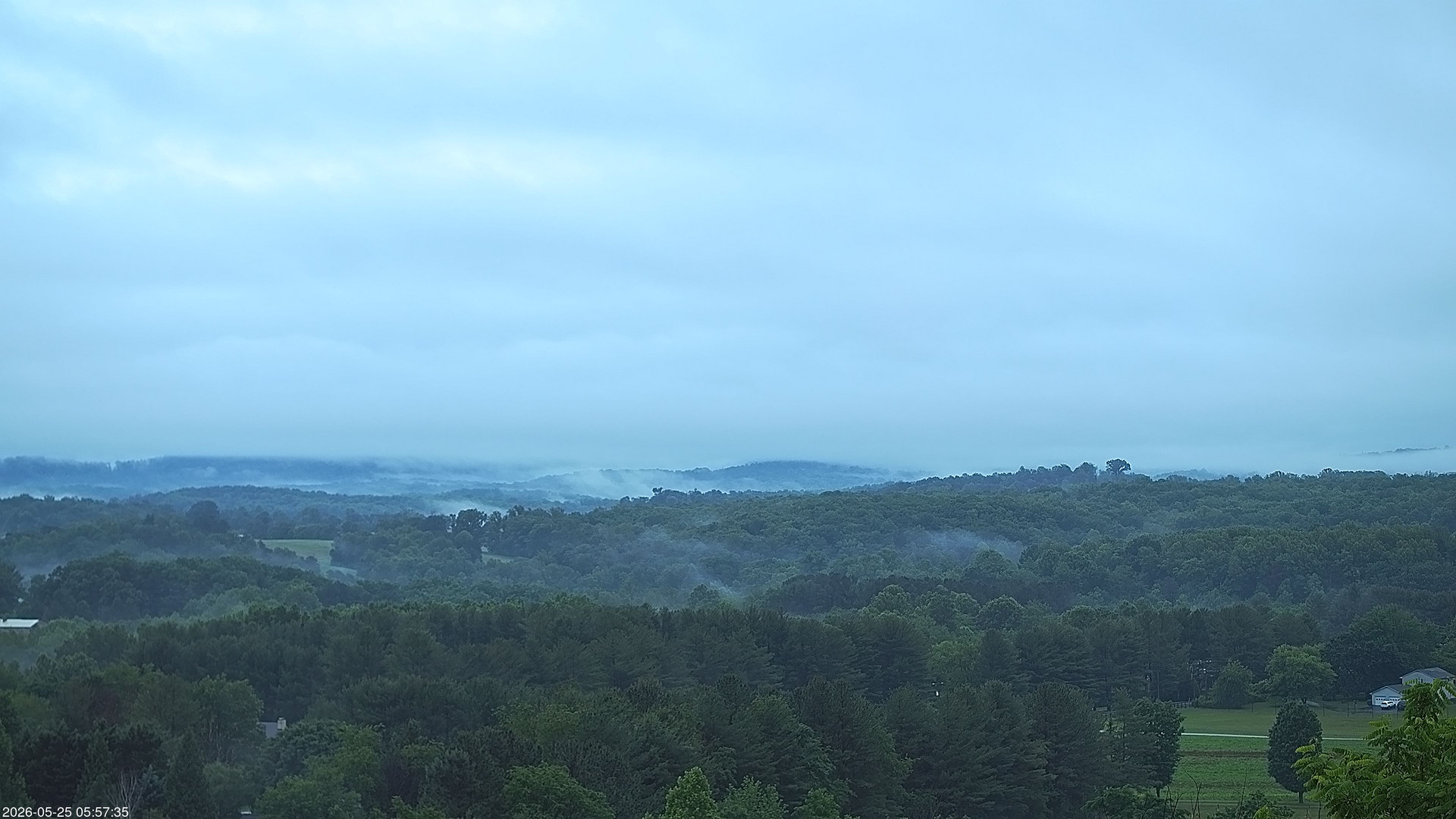 time-lapse frame, 2026-05-25 05:57-12:00 webcam
