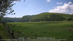 view from Webcam Cansiglio - verso la piana dei "Bech" on 2023-05-22