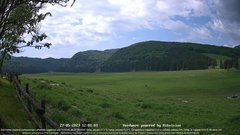view from Webcam Cansiglio - verso la piana dei "Bech" on 2023-05-27