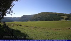 view from Webcam Cansiglio - verso la piana dei "Bech" on 2023-09-11