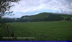 view from Webcam Cansiglio - verso la piana dei "Bech" on 2025-05-09
